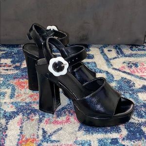 Black Block heels with flower buckle